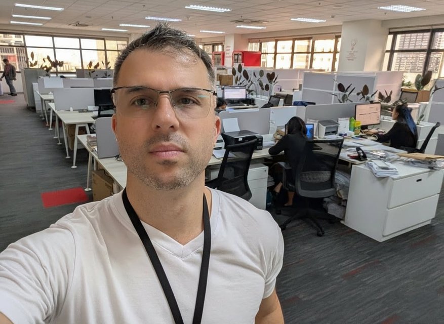 Mark Thomas Firestone at his workplace as a full-stack web developer